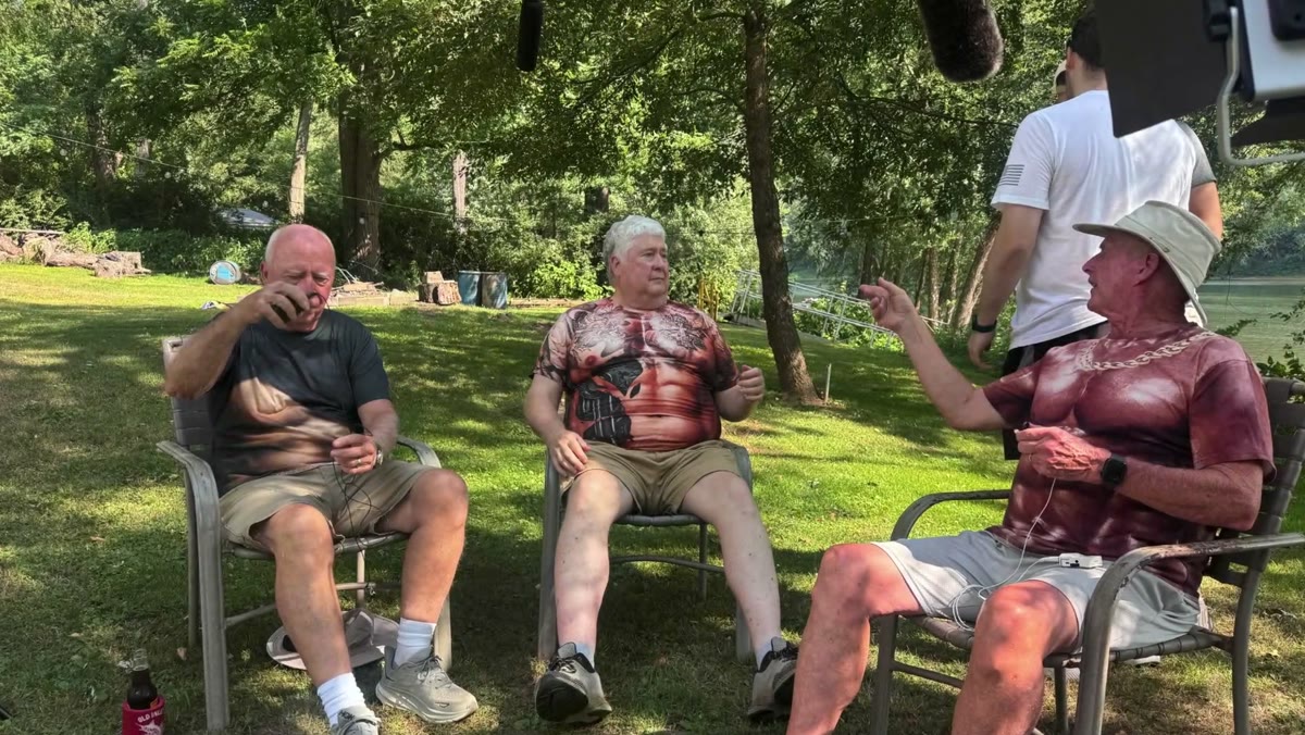 Family members telling stories together outdoors